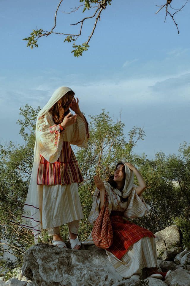Two women in traditional Palestinian dress